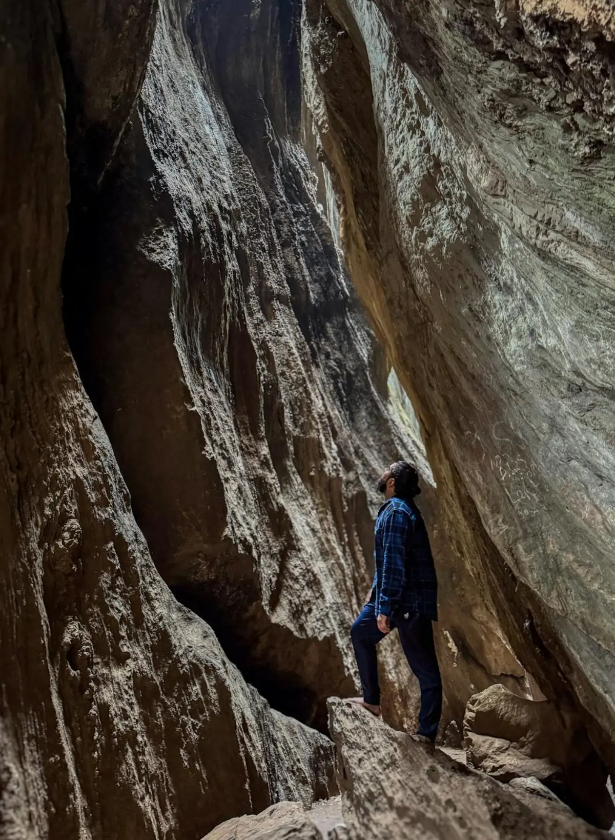 Dramatic rock cave in Wayanad — Wayanad tour package